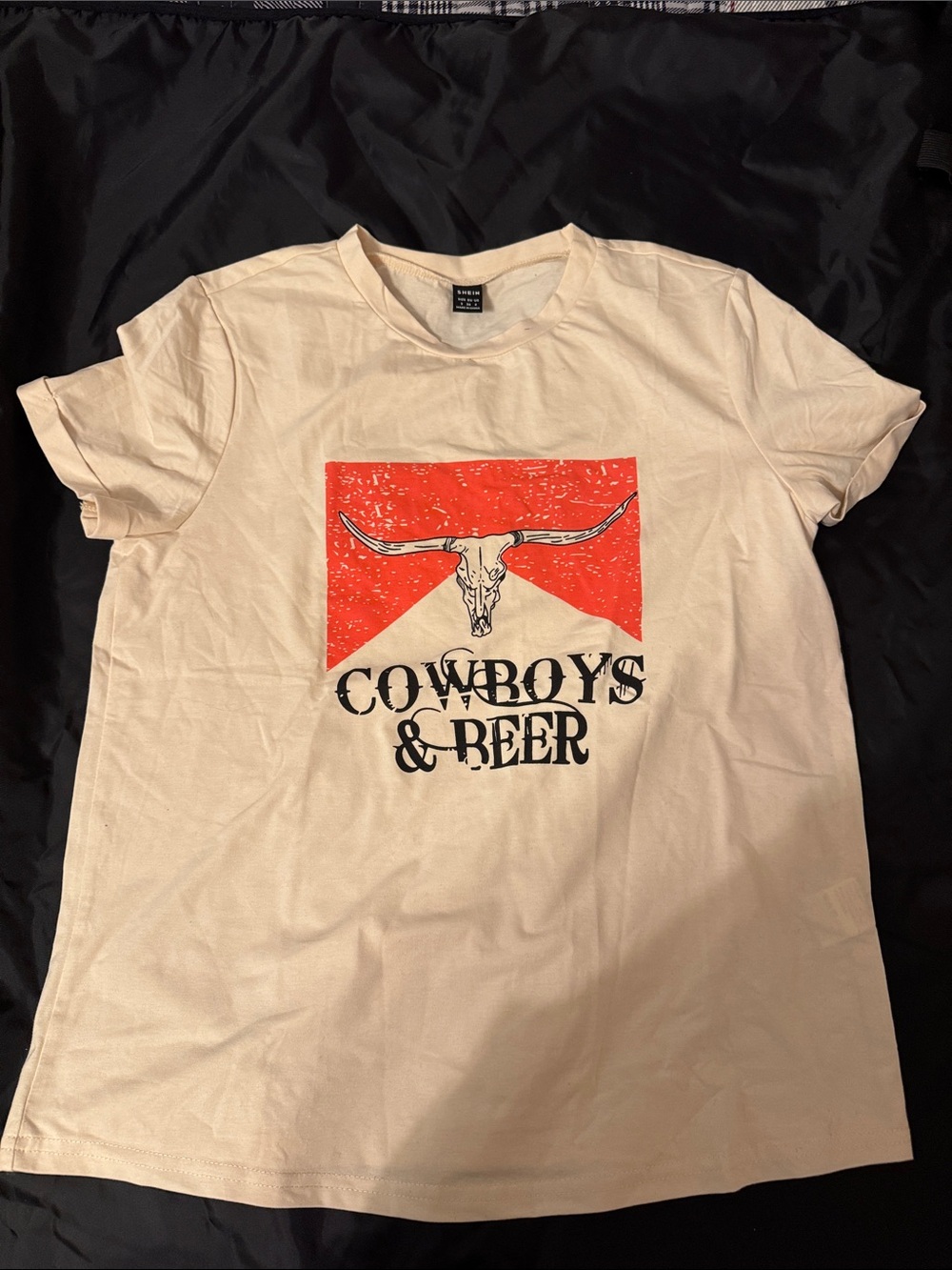 SHEIN Cream Tee with Orange Graphic and Black Print